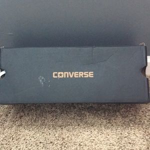 touquize low top converse